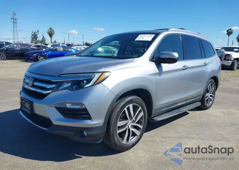 2017 Honda Pilot Touring из США, поврежденный, VIN 5FNYF6H94HB035502